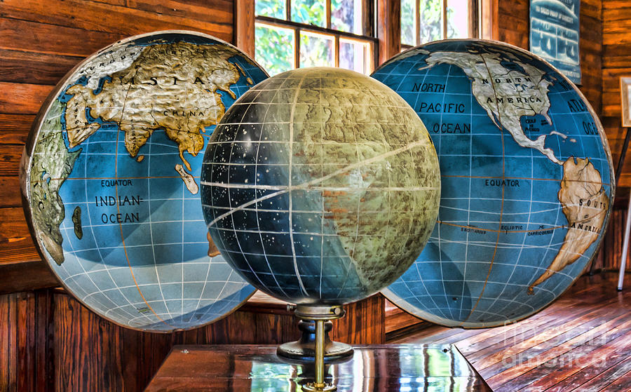 Split Globe at the Koreshan State Historic Site in Florida Photograph by William Kuta