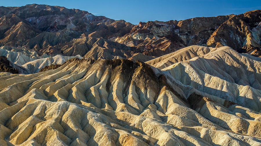 Amazing landscape of Zabriskie point in Death Valley Photograph by Pierre Leclerc Photography
