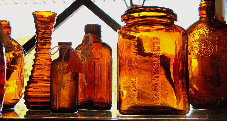 Amber Antique Jars Photograph by Kathy Barney