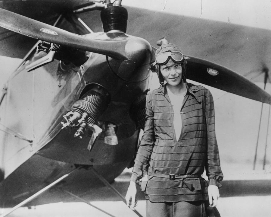 Ameila Earhart With Airplane Photograph by Getty Images Ameila Earhart With Airplane Photograph by Getty Images