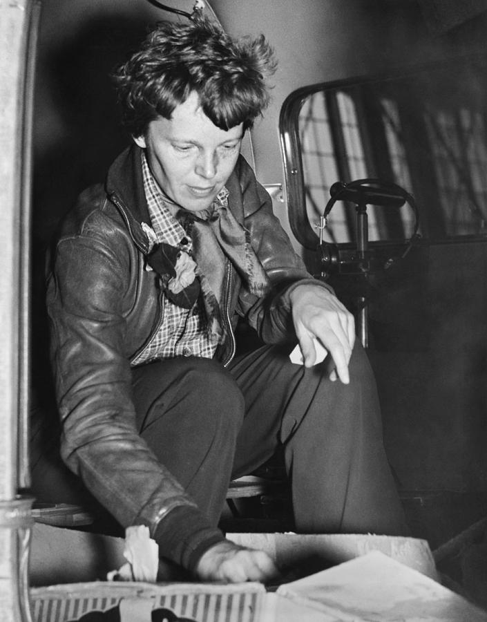 Oakland Photograph - Amelia Earhart Checks Supplies by Underwood Archives