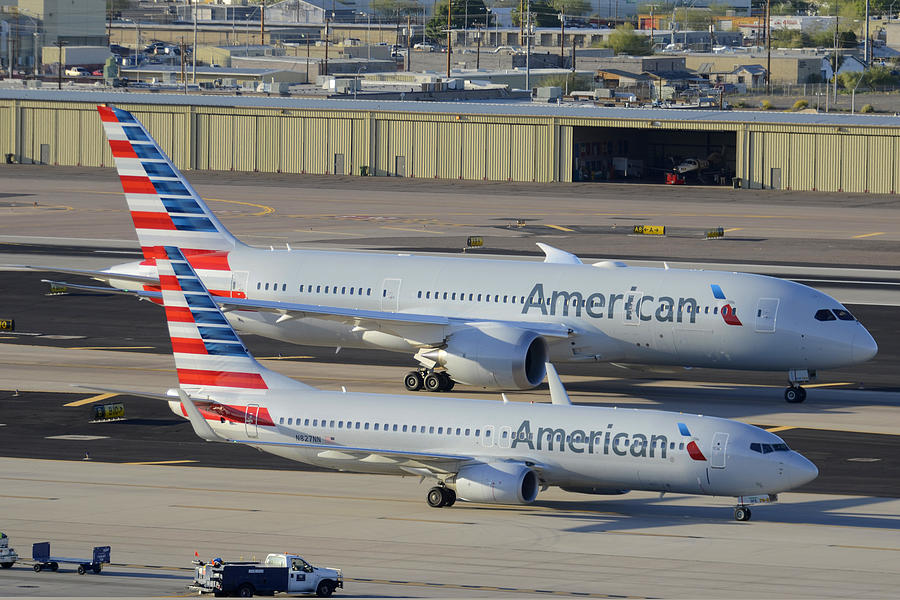American Boeing 737-823 N827NN and American Boeing 787-823 N801AC Phoenix Sky Harbor March 10 2015 Photograph by Brian Lockett