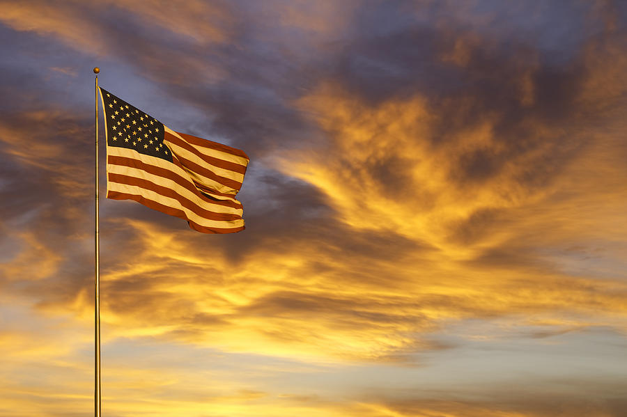American flag glow in sunset (P) Photograph by Ron and Patty Thomas