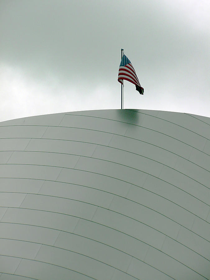 American flag on modern museum in LA Photograph by Mieczyslaw Rudek