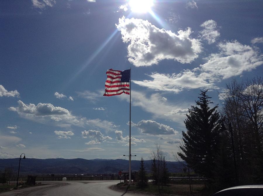 American Flag Waving in the Sunrays Photograph by Shawn Hughes