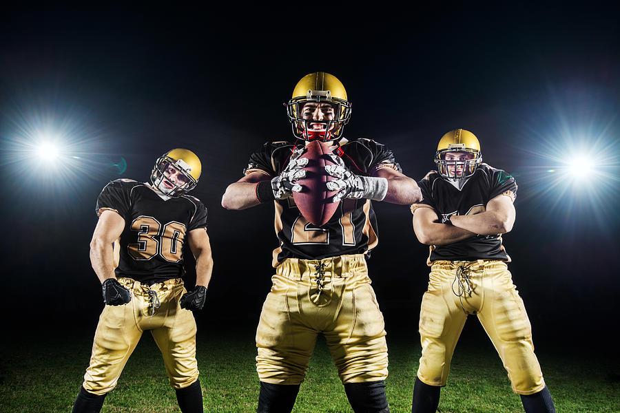 American football players. Photograph by Skynesher