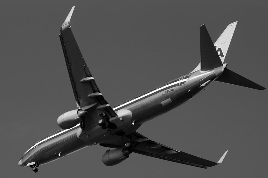 American Jet Landing Photograph by Daniel Woodrum