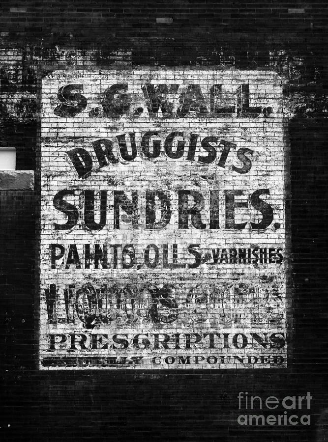 Americana Faded Old Brick Wall Drug Store Sign Black and White Photograph by Shawn OBrien