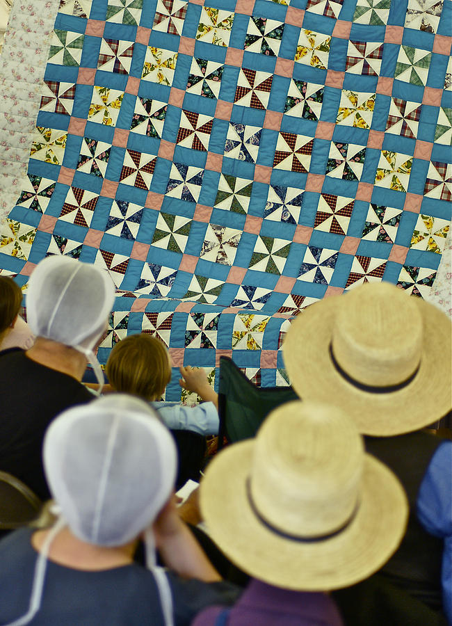 Amish at quilt auction  Photograph by Blair Seitz