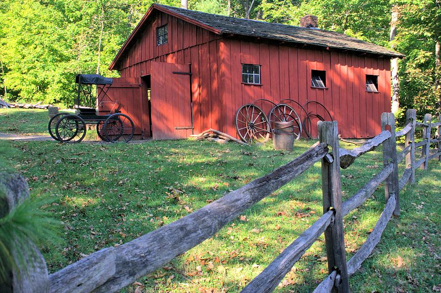 Amish Barn Along a Fenceline Photograph by Gordon Elwell