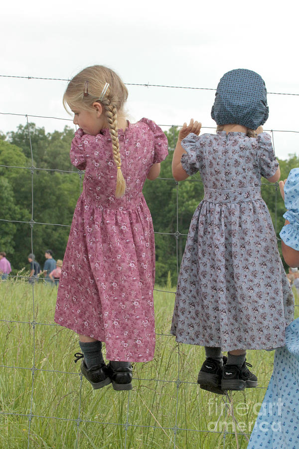 Amish Girls having fun Photograph by Dwight Cook