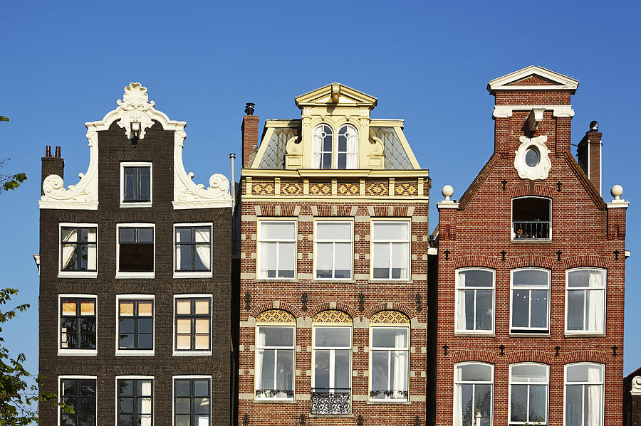 Amsterdam - Gables of old houses at the Herengracht Photograph by Olaf ...