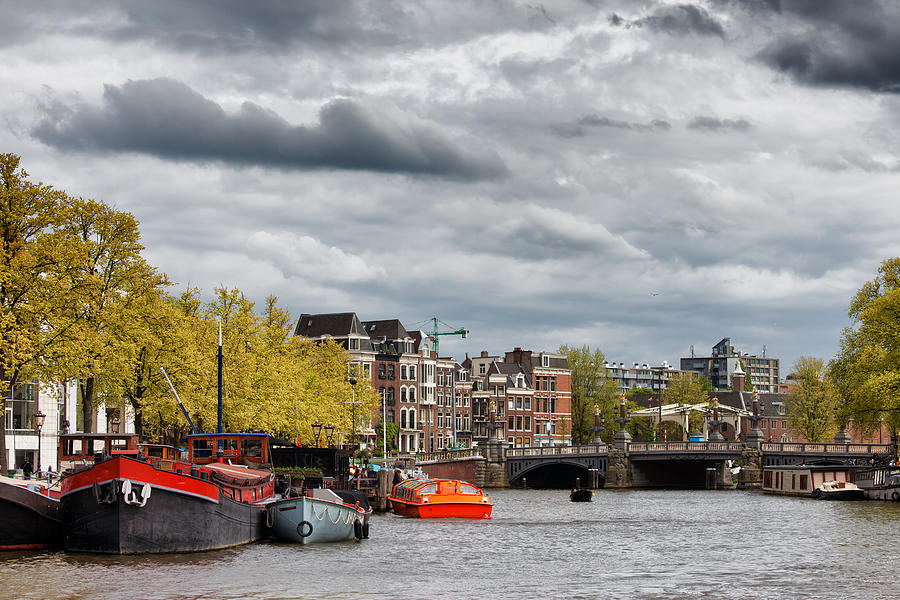 Amsterdam Cityscape from Amstel River Photograph by Artur Bogacki