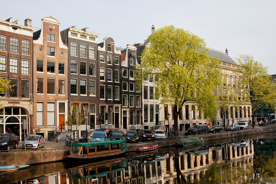 Architecture Photograph - Amsterdam Houses along the Singel Canal by Artur Bogacki