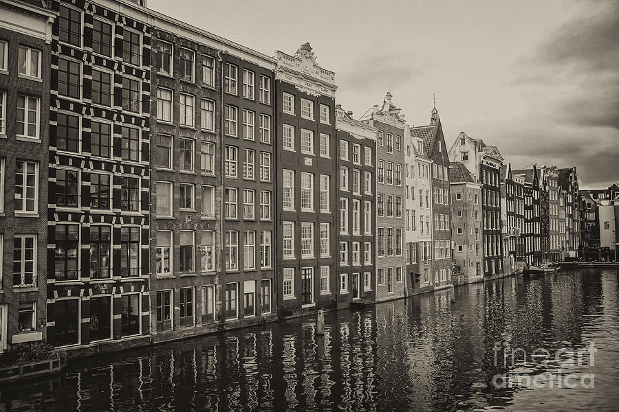 Amsterdam houses on a canal Photograph by Patricia Hofmeester