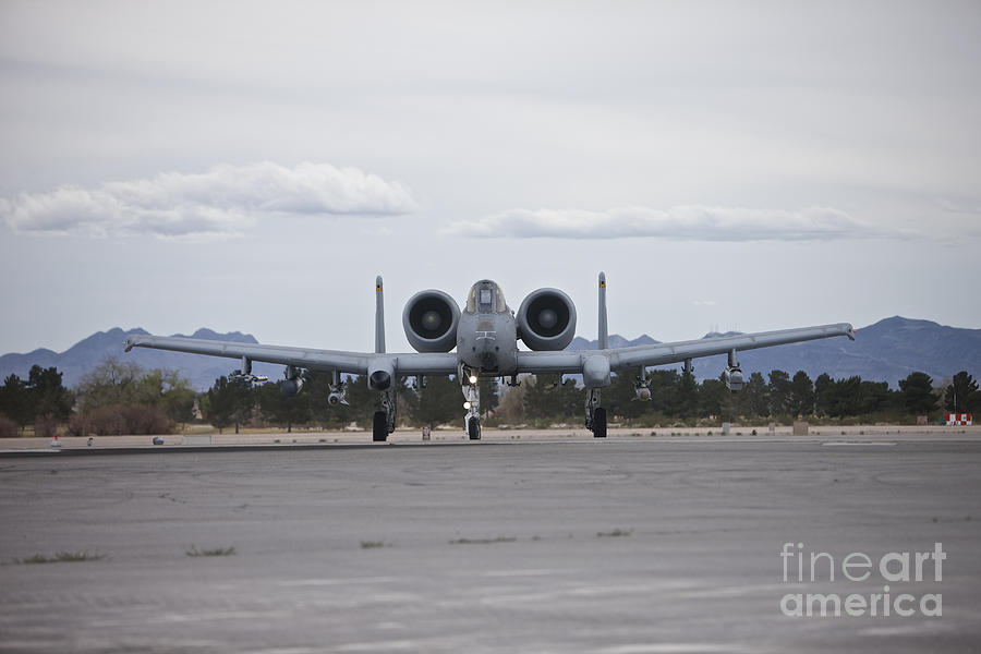 Transportation Photograph - An A-10 Thunderbolt Taxis To The Runway by Terry Moore
