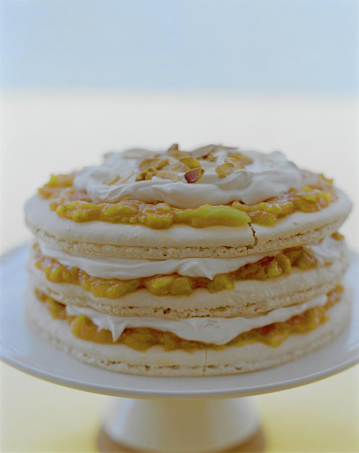 An Apricot Almond Layer Cake Photograph by Romulo Yanes