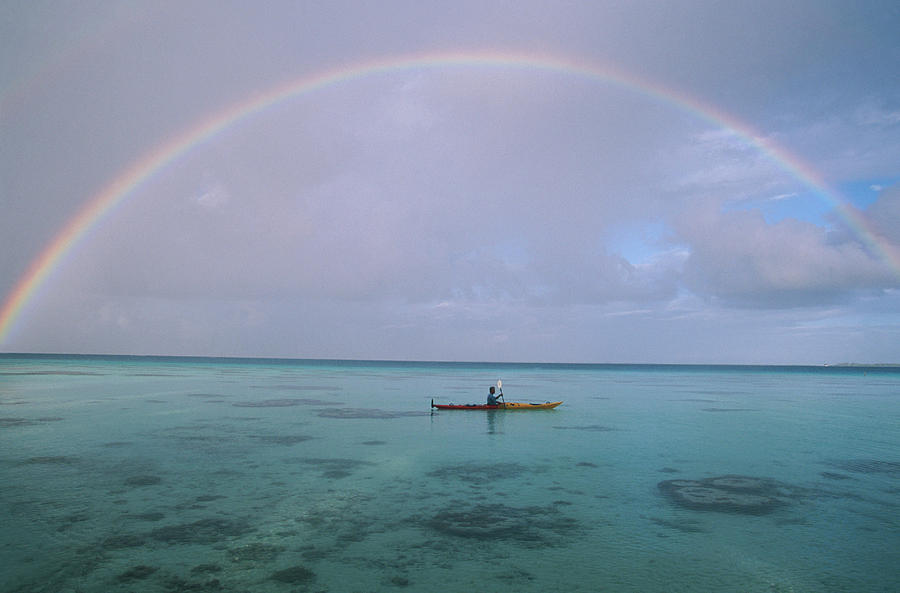 An Arc Of A Rainbow Is Seen Above A Man Photograph by Peter McBride An Arc Of A Rainbow Is Seen Above A Man Photograph by Peter McBride