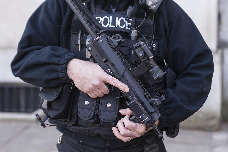 An armed Police Officer in London, England Photograph by Julian Elliott Photography