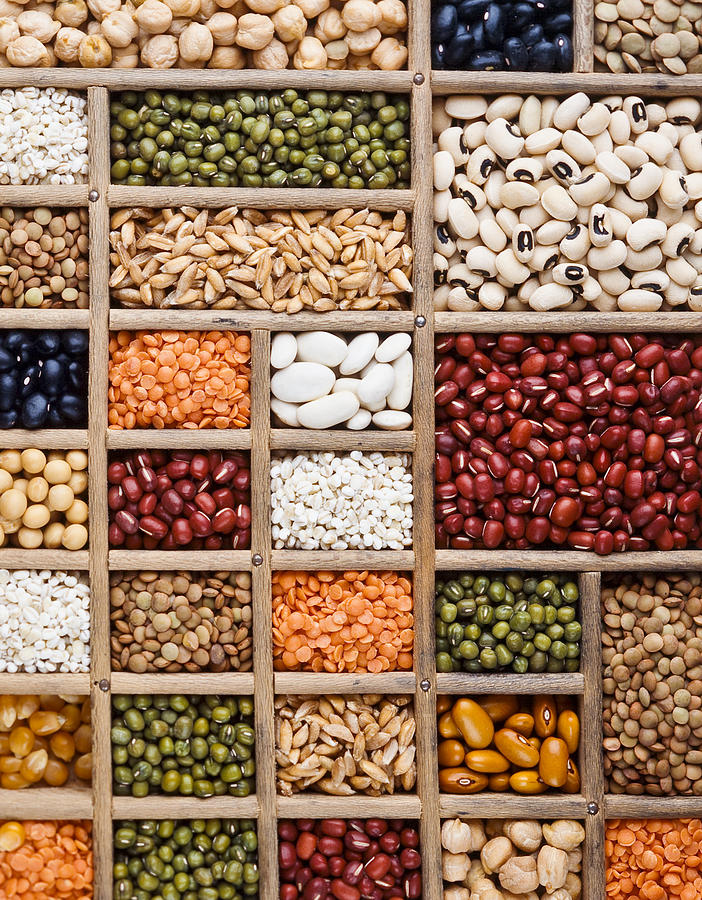 An arrangement of grain, seeds and legumes on a wooden box Photograph by Ambaradan An arrangement of grain, seeds and legumes on a wooden box Photograph by Ambaradan