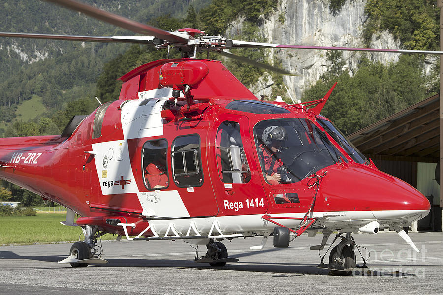 An Aw109 Helicopter Of The Swiss Air Photograph by Luca Nicolotti