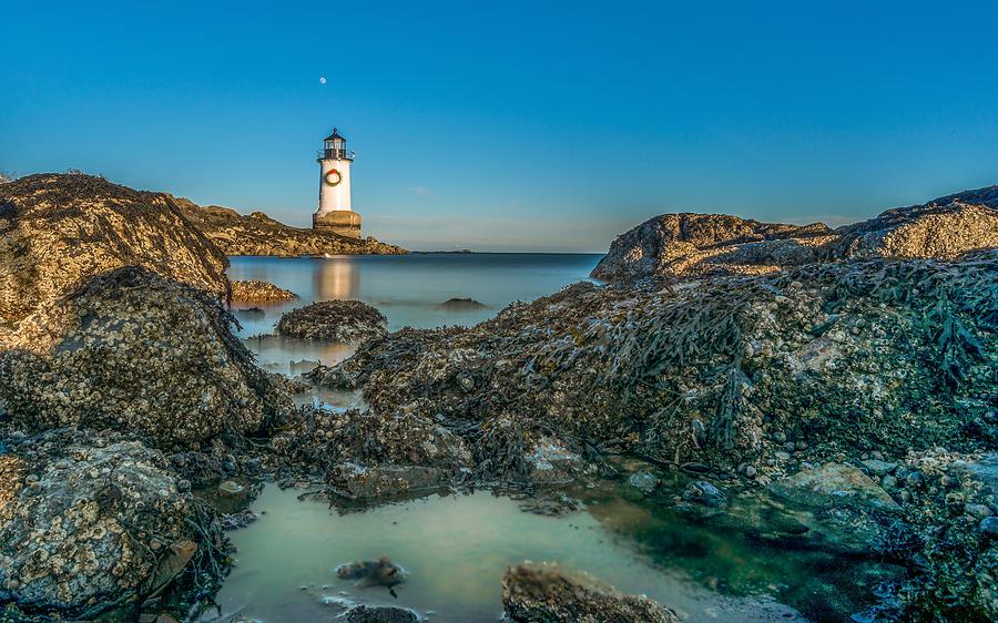 An early moon over Fort Pickering Light Salem MA Photograph by Bryan Xavier
