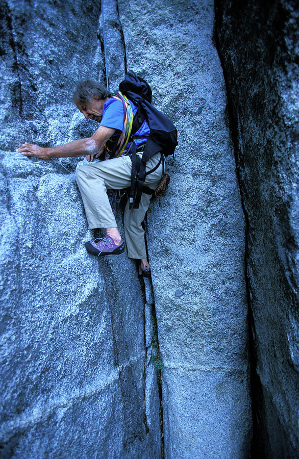 An Elderly Man Rock Climbing Photograph By Corey Rich