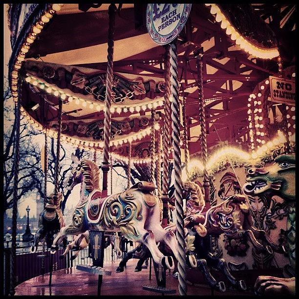 London Photograph - An Empty Merry-go-round On A Wet Day by Andy Mcdermott