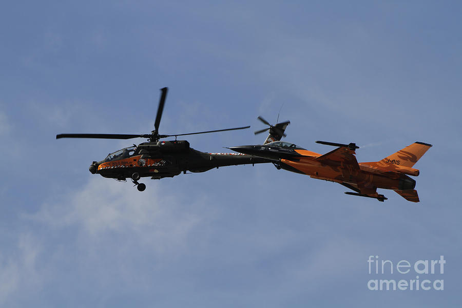 Transportation Photograph - An F-16 Falcon And Ah-64 Apache by Ofer Zidon