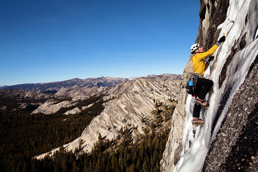 An Ice Climber Climbs Yellow Brick Road Photograph by Kyle Sparks - Pixels