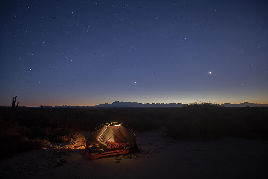 An Illuminated Tent Under A Starry Sky Photograph by Woods Wheatcroft ...