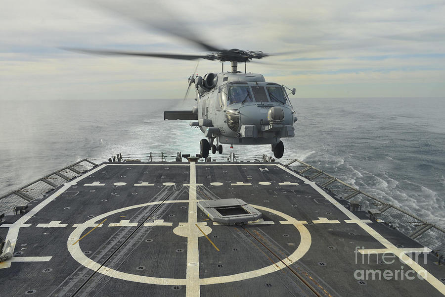 An Mh-60r Sea Hawk Helicopter Lands Photograph