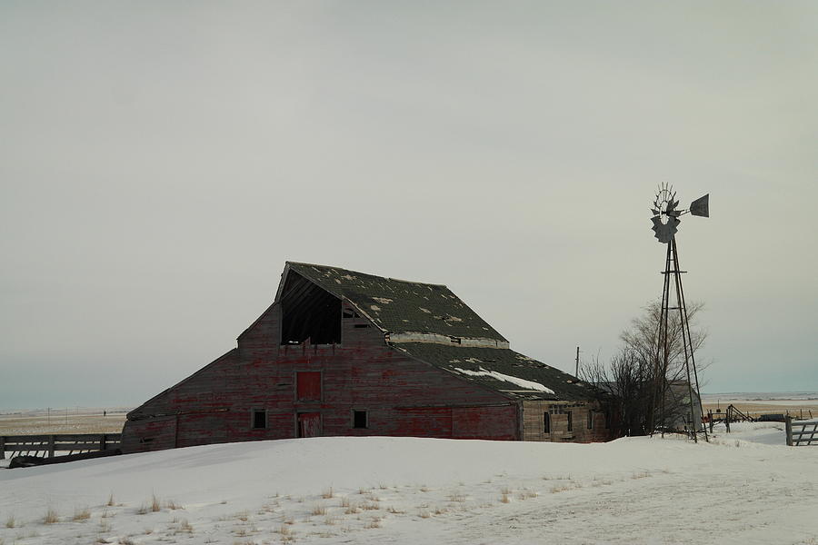 An Old Barn And Windmill Photograph