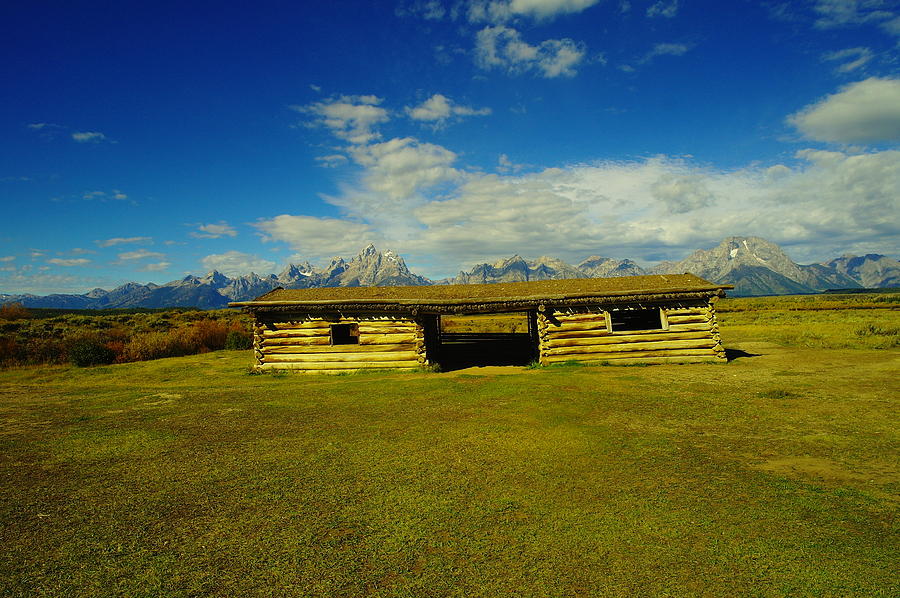 An Old Cabin Foreground The Grand Tetons Photograph by Jeff Swan