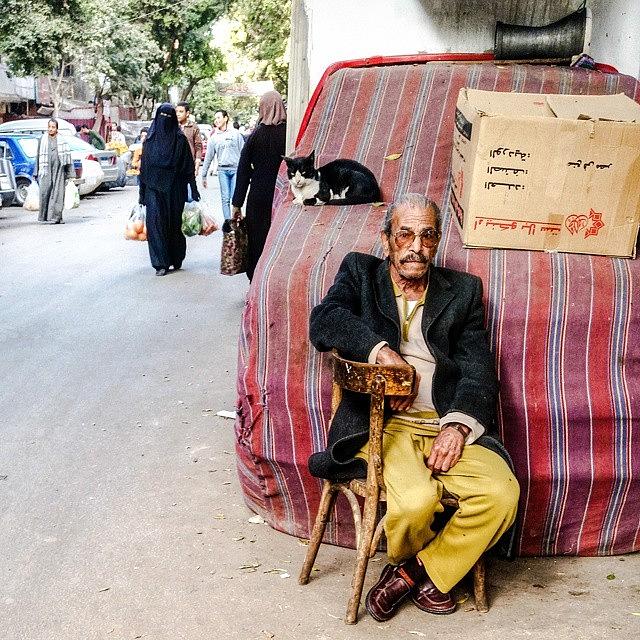 Egypt Photograph - An Old Man Enjoying His Afternoon On by Mattias Pruym