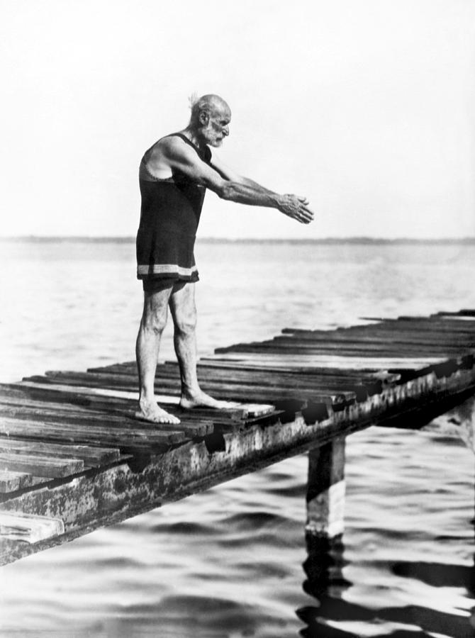 An Old Man Prepares To Dive Photograph By Underwood Archives Fine Art