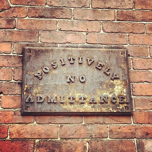 An Old Sign On A Brick Mill Building Photograph by Raam Dev