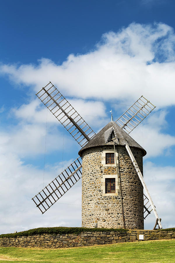 An Old Stone Windmill On A Hillside Photograph by Michael Interisano