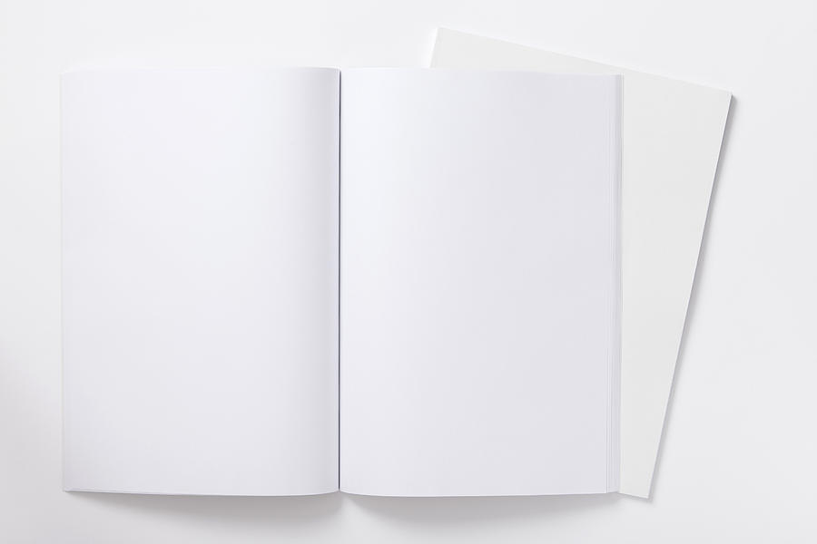 An open blank notebook ready to be filled Photograph by Tarik Kizilkaya