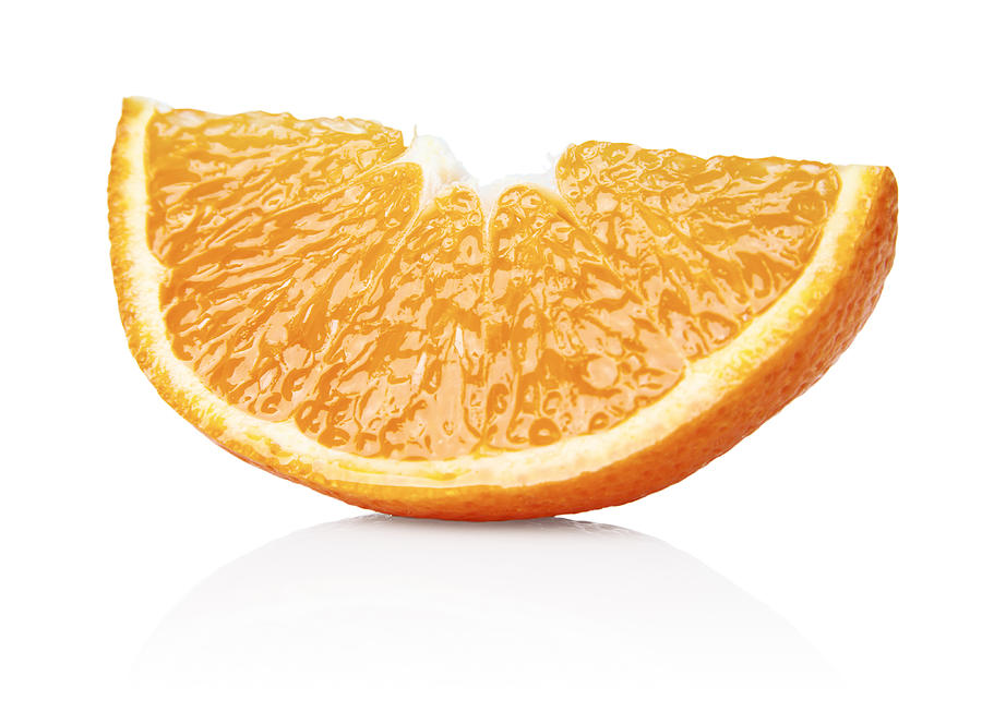 An orange segment Photograph by Creative Crop