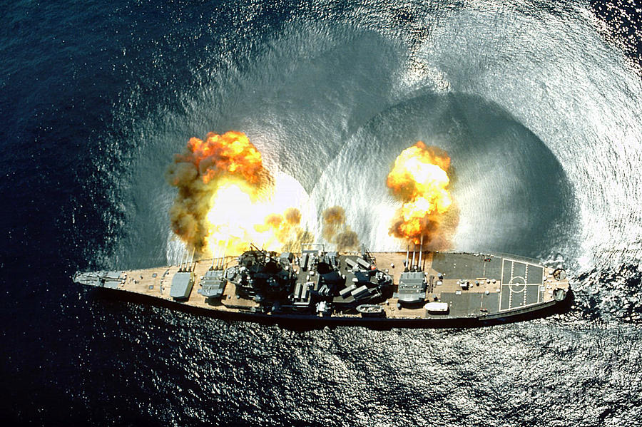 An overhead view of the battleship USS IOWA BB61 firing all 15 of its guns Photograph by Paul Fearn