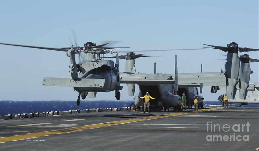 An Sh-60 Sea Hawk Lands On The Flight Photograph