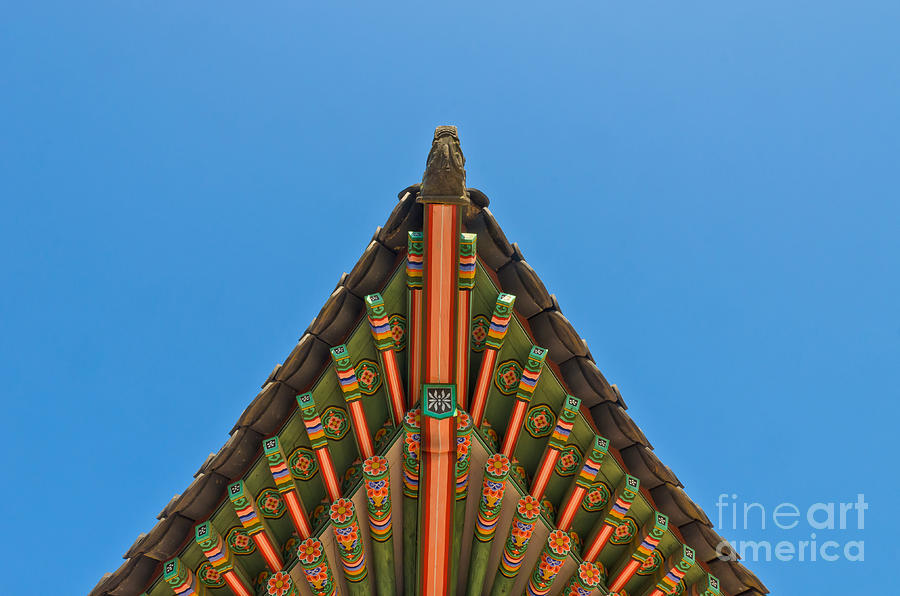 Architecture Photograph - Ancient korean style end roof decorative ornament by Vorakorn Kanokpipat