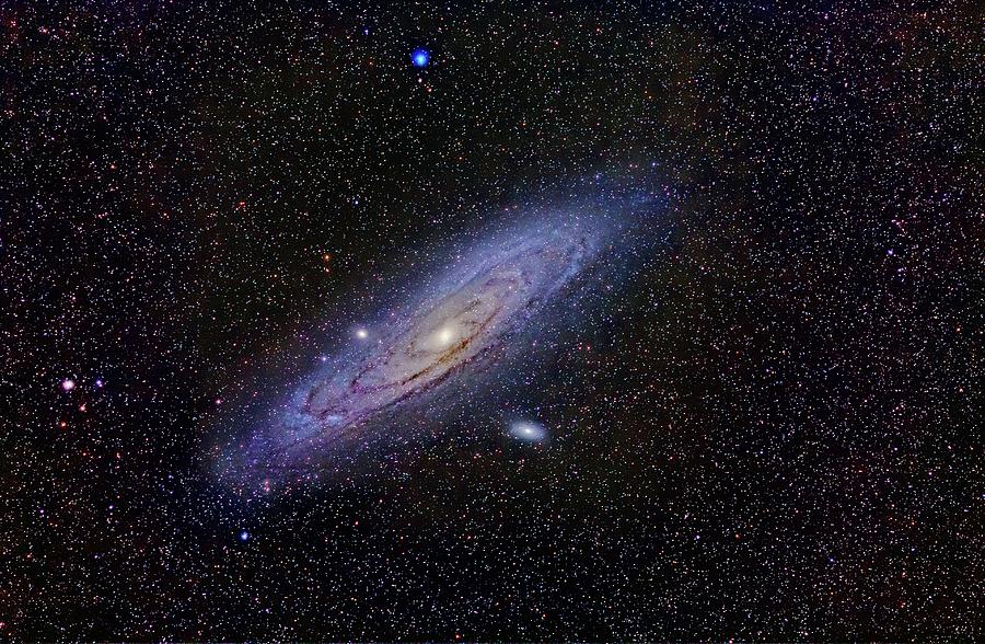Space Photograph - Andromeda Galaxy by Juan Carlos Casado (starryearth.com) / Science Photo Library