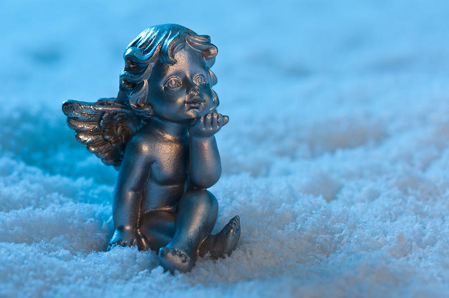 Angel in the snow Photograph by U Schade