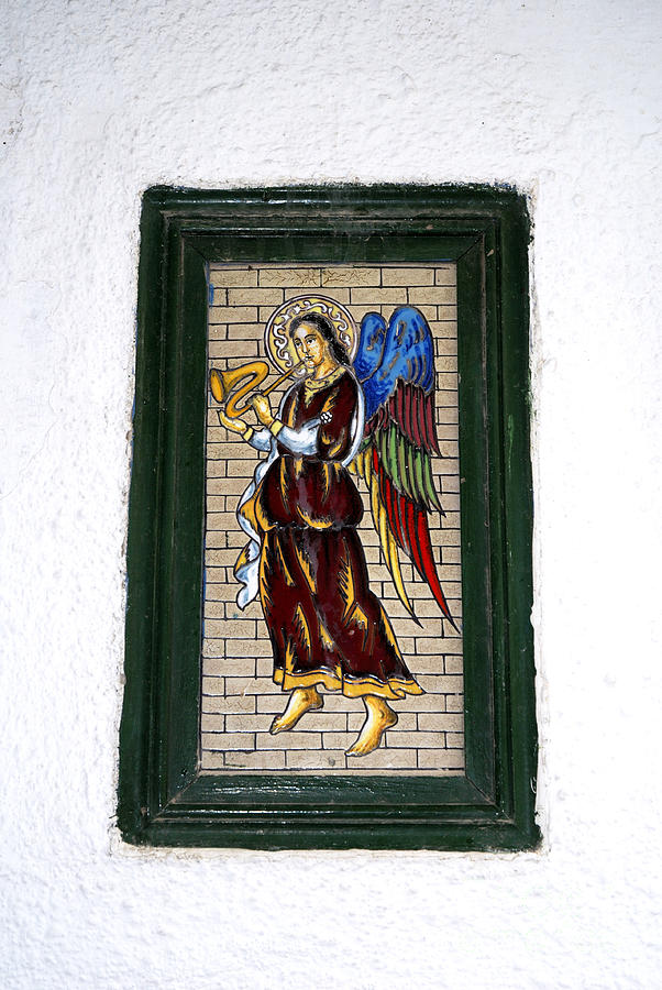 Angel on Marbella Old Town Wall Photograph by Brenda Kean