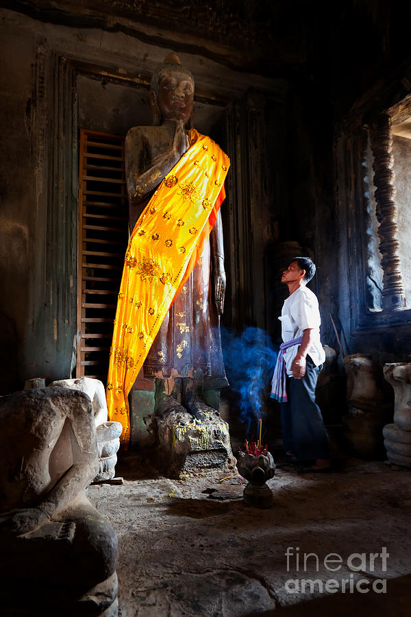 Angkor Wat Devotee Lights Incense in Buddha Temple Photograph by Jo Ann Tomaselli
