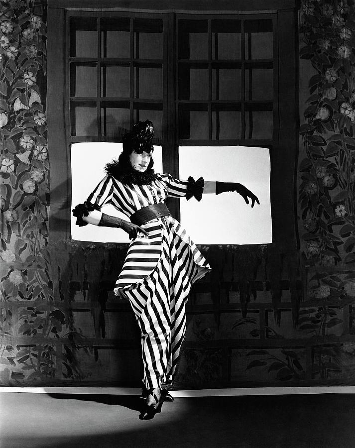 Angna Enters Miming While Wearing A Costume Photograph by Horst P. Horst