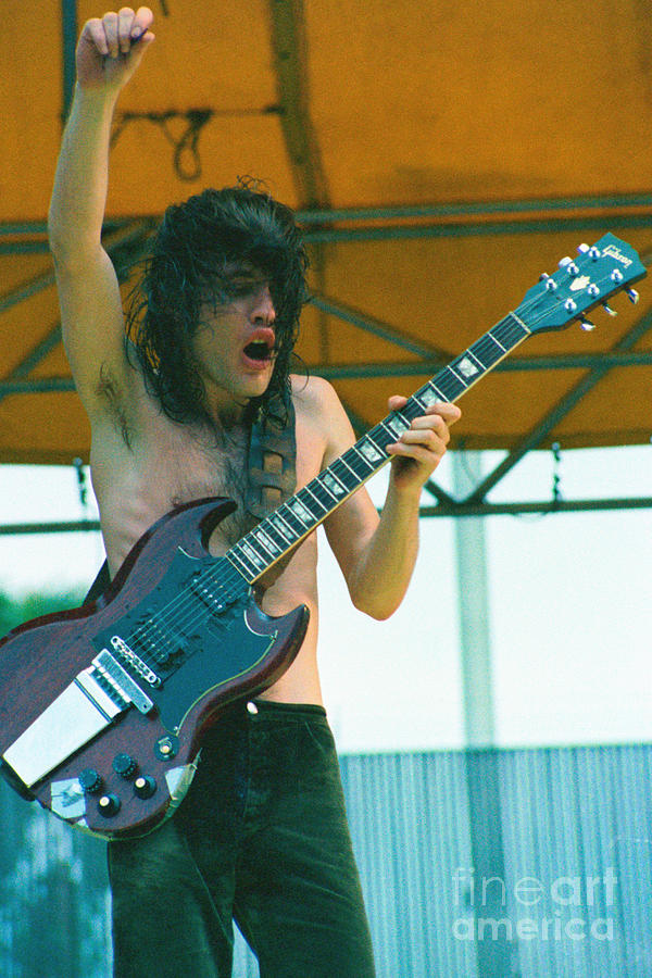 Angus Young of AC DC at Day on the Green Monsters of Rock - July 1979  Photograph by Daniel Larsen