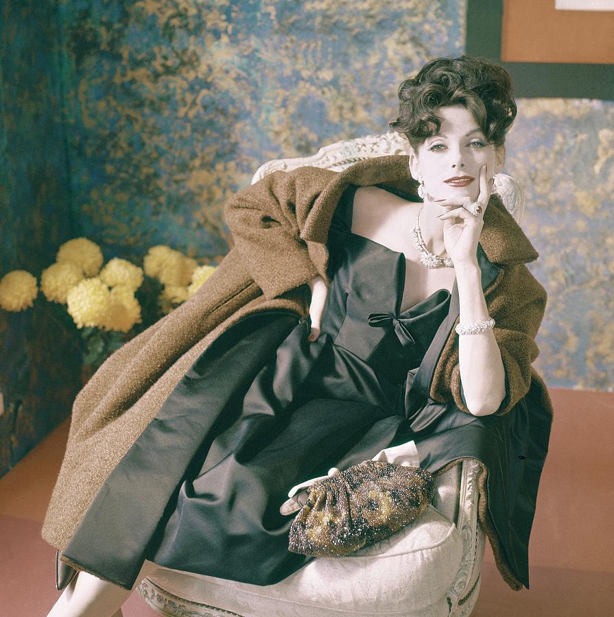 Anne St. Marie Wearing A Coat And Dress Photograph by Horst P. Horst